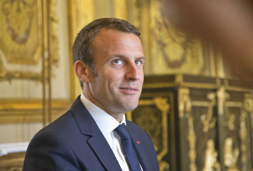 French President Emmanuel Macron looks on during a meeting with CGT Union leader Philippe Martinez at the Elysee Palace in Paris