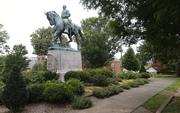 The statue of Confederate General Robert E. Lee still stands in Lee park in Charlottesville