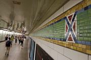 The mosaic tile design meant to represent Times Square's status as the "Crossroads of the World" is part of the subway station's border