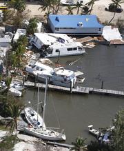 Boats and buildings are damaged in the aftermath of Hurricane Irma