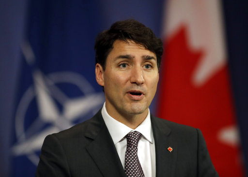 Canadian Prime Minister Justin Trudeau gives a speech at NATO headquarters in Brussels