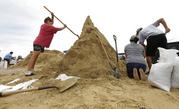 Residents fill sand bags as they prepare for Hurricane Harvey