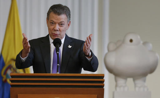 Colombia's President Juan Manuel Santos speaks to supporters of the peace deal he signed with rebels of the Revolutionary Armed Forces of Colombia