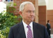 U.S. Attorney General Jeff Sessions starts to walk away after an interview with The Associated Press at the U.S. Embassy in San Salvador
