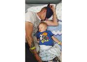 This undated mobile phone photo made available by Shelby Hoogendyk shows her husband Casey Huffman