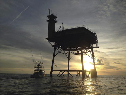 This photo provided by Jacob Jordan shows Frying Pan Tower. A North Carolina man and his fiancee are riding out Hurricane Matthew on top of the old Coast Guard light station more than 30 miles off the Atlantic coast. Richard Neal is the owner of Frying Pan Tower