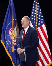Interior Secretary Ryan Zinke takes the stage before President Donald Trump speaks at the Utah State Capitol Monday