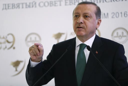 Turkish President Recep Tayyip Erdogan speaks during a meeting on Islam in Eurasia in Istanbul