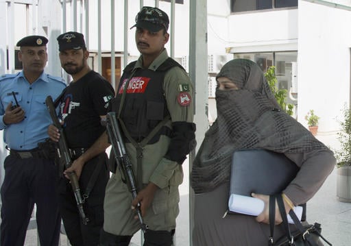 A Pakistani lawmaker from Pakistan's religious party leaves Parliament after attending a session in Islamabad