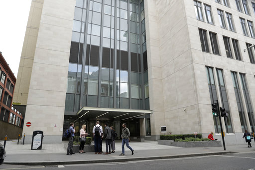 An exterior view shows the main entrance of St Bartholomew's Hospital