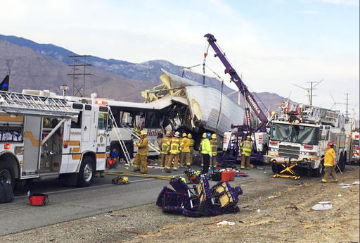 This photo provided by KESQ NewsChannel 3/CBS Local 2 shows the scene of crash between a tour bus and a semi-truck on Interstate 10 near Desert Hot Springs