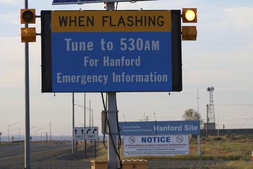 An emergency sign flashes by the Hanford Nuclear Reservation Tuesday