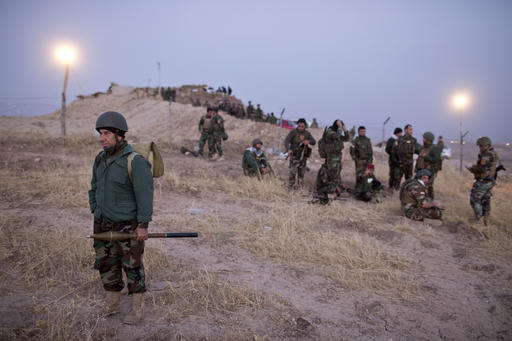 Kurdish Peshmerga forces gather prior to opening up a front against Islamic state in Nawaran