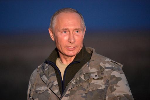 Russian President Vladimir Putin visits a reserve for Przewalski's horses near the Urals city of Orenburg