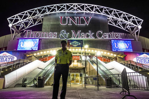 A member of the security team stands in front of the presidential debate site at the University of Nevada