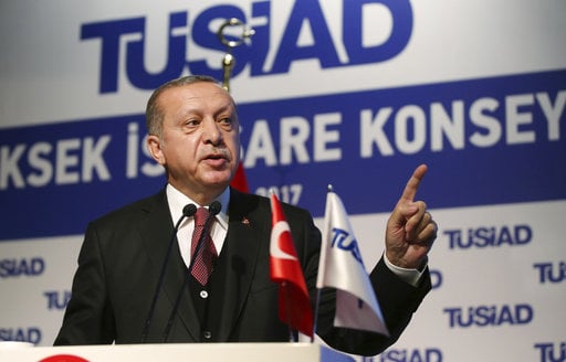 Turkey's President Recep Tayyip Erdogan addresses a business meeting in Istanbul