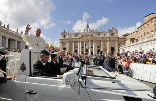 Pope Francis waves to faithful as leaves at the end of a jubilee mass he celebrated in St. Peter's Square