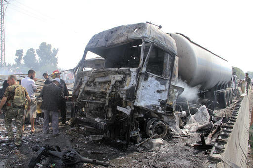 In this photo released by the Syrian official news agency SANA