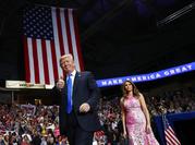 President Donald Trump and first lady Melania Trump arrive for a rally