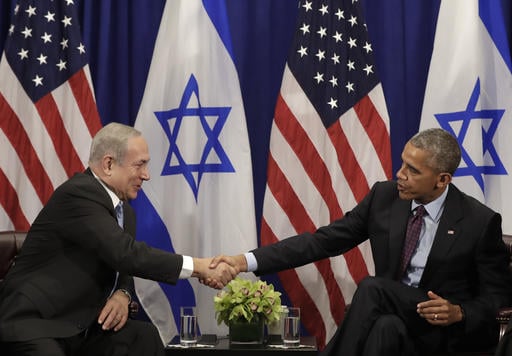 President Barack Obama shakes hands with Israeli Prime Minister Benjamin Netanyahu during a bilateral meeting at the Lotte New York Palace Hotel in New York