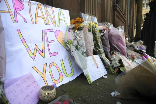 Flower tributes at St Ann's square