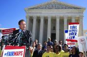 Former California Gov. Arnold Schwarzenegger speaks at a rally outside the U.S. Supreme Court in Washington