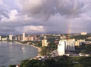 A rainbow appears over Tumon Bay