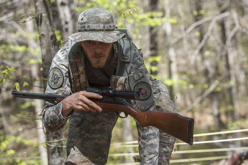 Joshua Goodman navigates through obstacles in the woods in Jackson