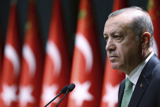Turkey's President Recep Tayyip Erdogan addresses a meeting in Ankara