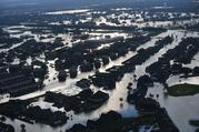 Floodwaters from Tropical Storm Harvey surround homes in Port Arthur