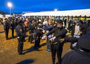 People pass through a security checkpoint on Staten Island before the start of the New York City Marathon Sunday