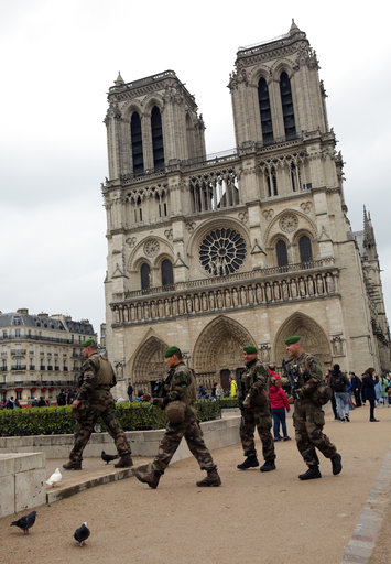 French soldiers patrol outside Notre Dame Cathedral Sunday