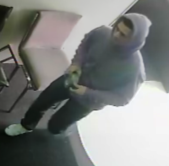 Security camera image of one of three suspects in armed robbery of Beat the Clock Tax Service in Lexington 12-23-16