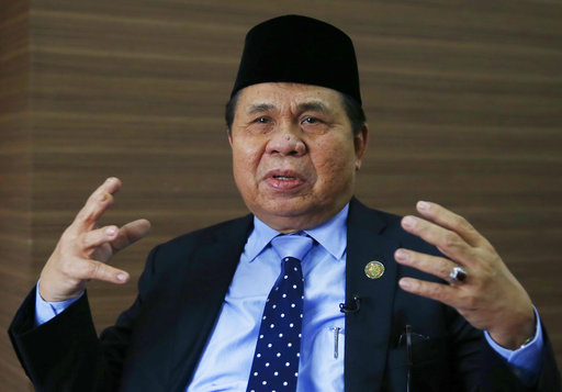 Chair of the Moro Islamic Liberation Front (MILF) Al Haj Murad Ebrahim talks to The Associated Press in Makati city east of Manila