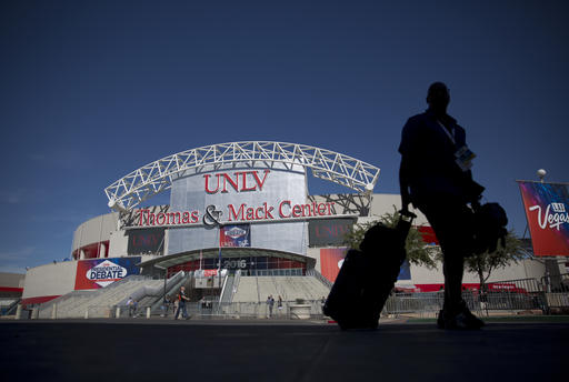 A member of the media walks past the Thomas & Mack Center