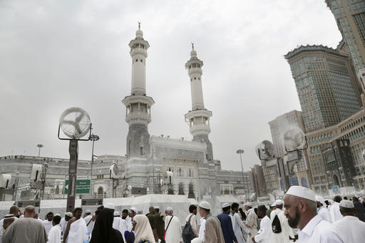 Muslim pilgrims make their way at the Grand Mosque in the Muslim holy city of Mecca