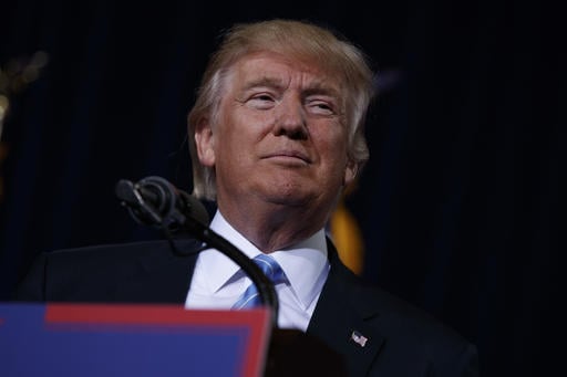 Republican presidential candidate Donald Trump delivers an immigration policy speech during a campaign rally at the Phoenix Convention Center