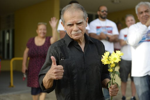 Puerto Rican nationalist Oscar Lopez Rivera gestures as he is released from home confinement after 36 years in federal custody