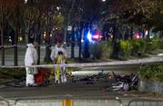 Bicycles and debris lay on a bike path at the crime scene where investigators work after a motorist earlier in the day drove onto the path near the World Trade Center memorial