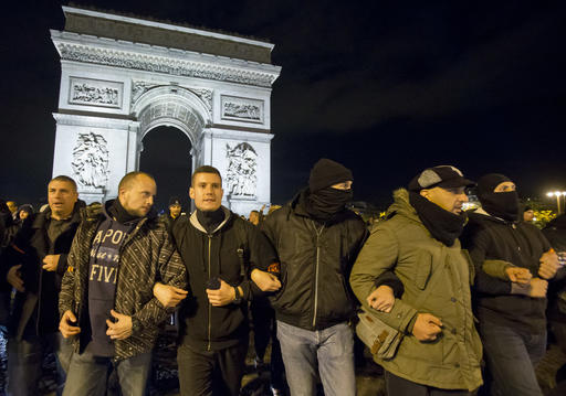 Police officers march in a rally to protest their working condition at the Champs Elysee avenue in Paris
