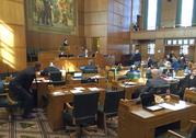 Oregon Representatives debate on the House floor at the Capitol in Salem