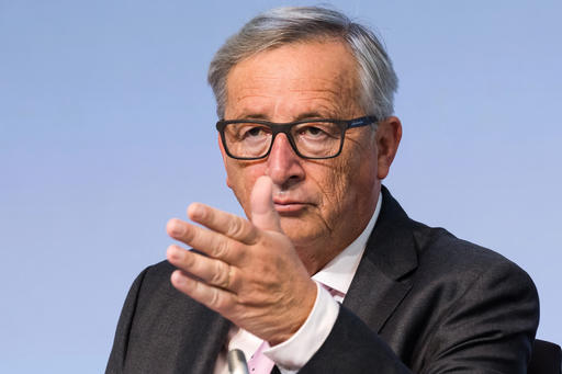 European Commission President Jean-Claude Juncker gestures during a plenary session of European Economic and Social Committee at the EU Charlemagne building in Brussels on Thursday
