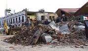 Soldiers remove debris from a partly collapsed municipal building after an earthquake in Juchitan