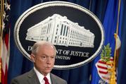 Attorney General Jeff Sessions attends a news conference at the Justice Department in Washington