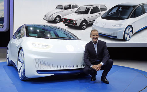 Volkswagen CEO Herbert Deiss introduces the new Volkswagen electric car during a press conference at the Paris Motor Show in Paris