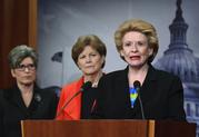 CORRECTS NAME OF SEN. STABENOW ON RIGHT - Sen. Debbie Stabenow
