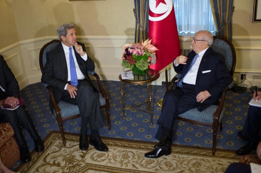 U.S. Secretary of State John Kerry sits with President Beji Caid Essebsi of Tunisia during a bilateral meeting Monday
