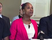 Demetria Hester speaks during a press conference in Portland