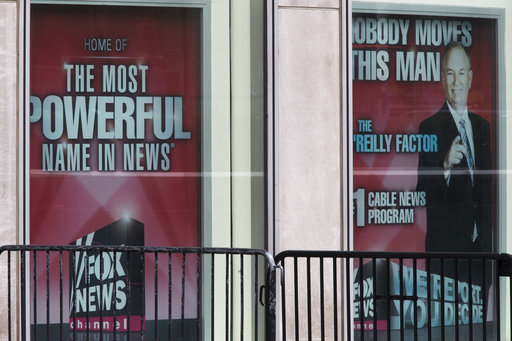 Posters featuring Bill O'Reilly are displayed at the News Corp. headquarters in Midtown Manhattan