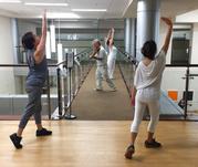 Violinist Anthony Hyatt leads dancers through MedStar Georgetown University Hospital in Washington on Oct. 11